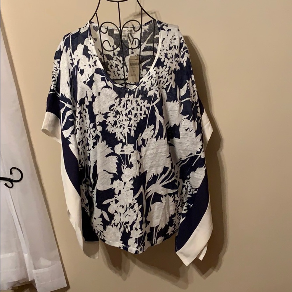 Navy and white floral pullover blouse